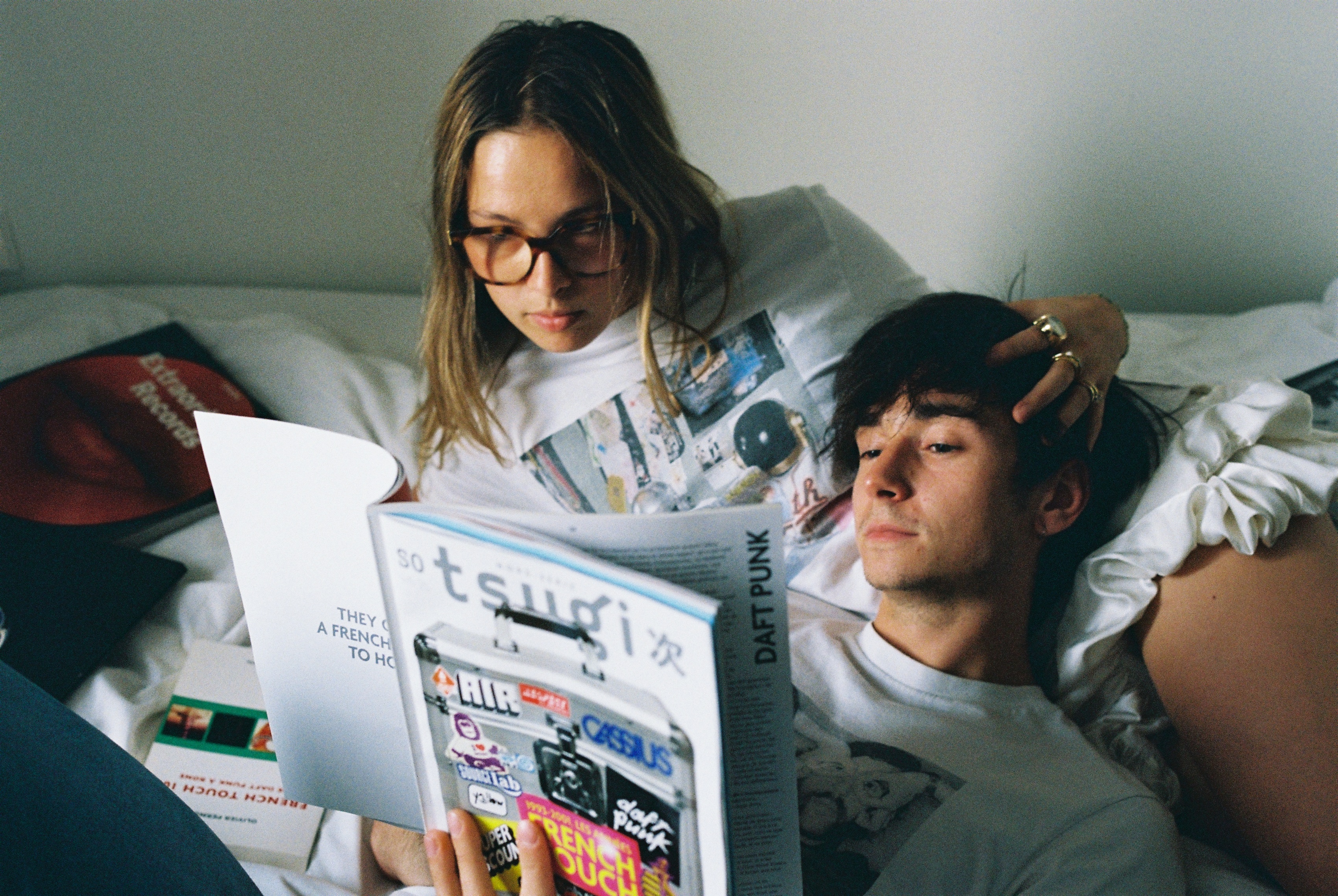 Louise and Valentin reading a French touch magazine